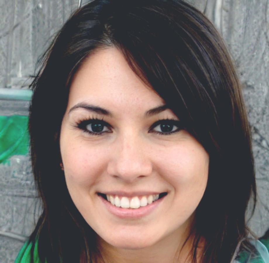 Portrait of Saoirse reviewing financial documents